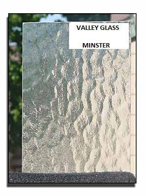 Textured frosted glass sample labeled “VALLEY GLASS MINSTER” in a display frame