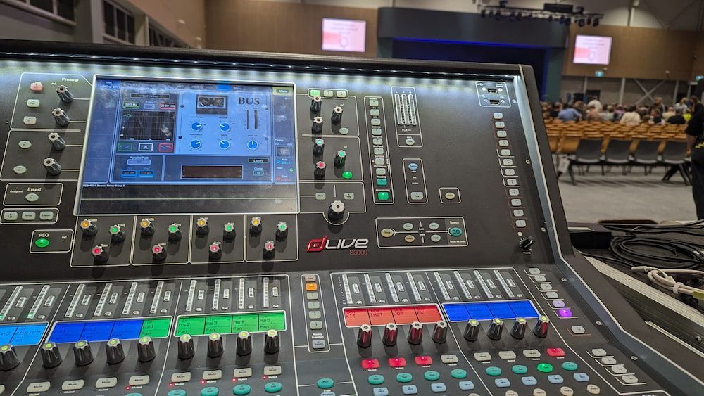 A Mixer is Sitting in Front of a Crowd of People in a Church — Inspired Audio Visual in Port Macquarie, NSW