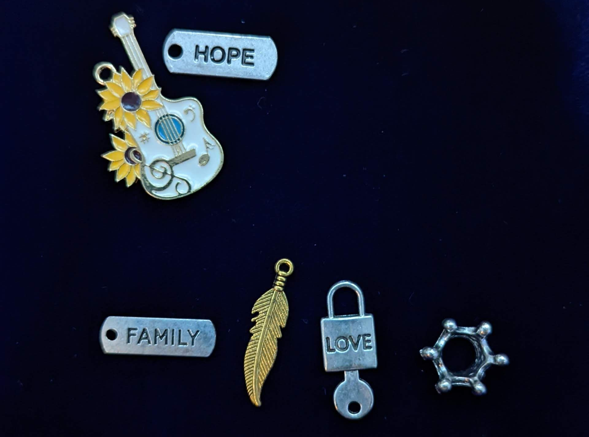 Charms: guitar,