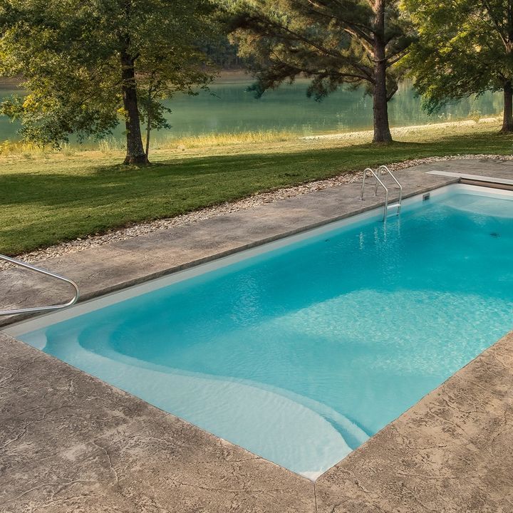 A Large Swimming Pool Surrounded by Trees - Madison, AL - Valley Pools