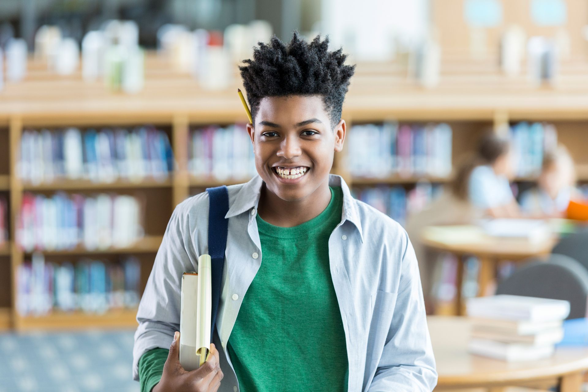 Happy Teen in the library
