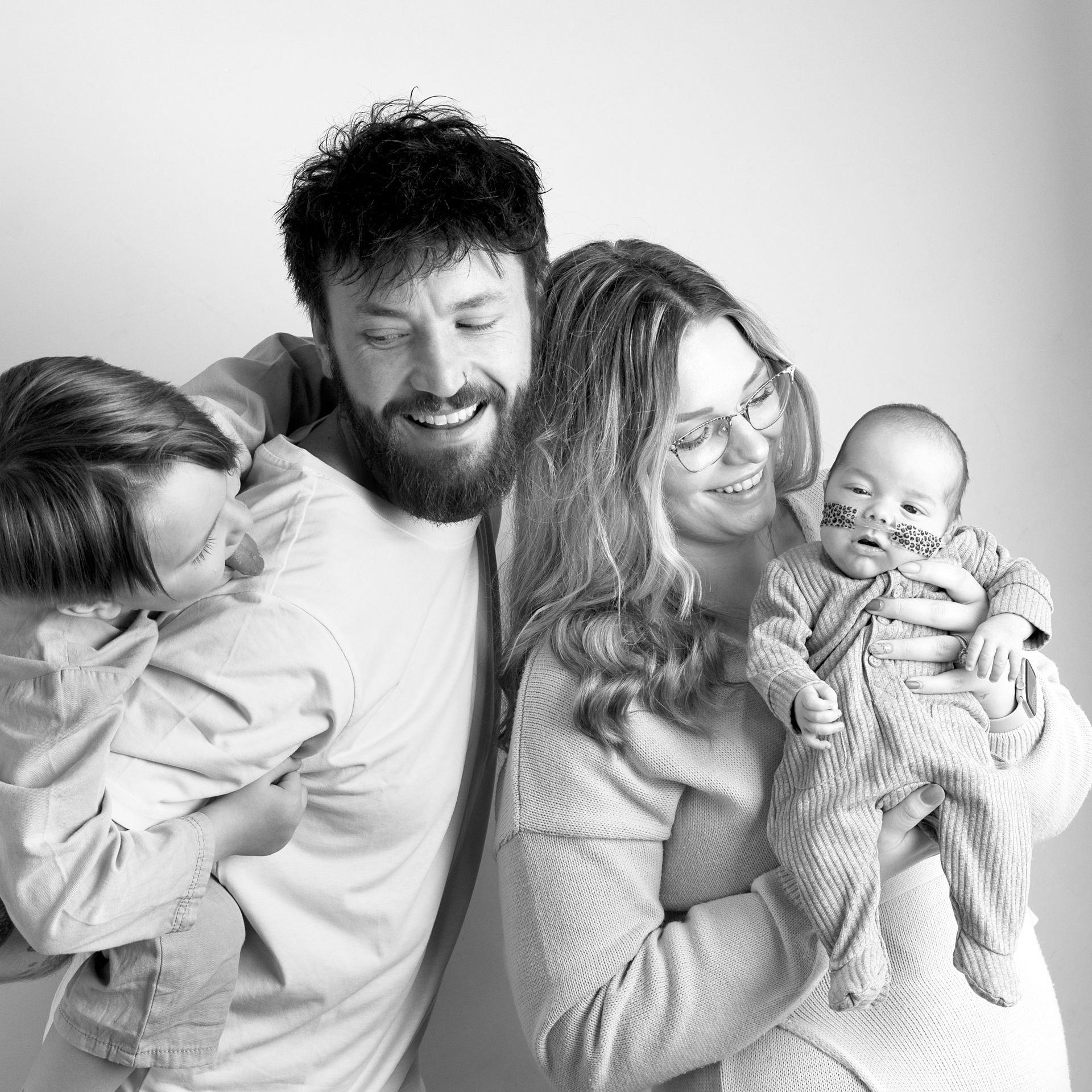 Family together at The Toy Box Baby photoshoot in Braintree Essex. For newborns to nearly walking