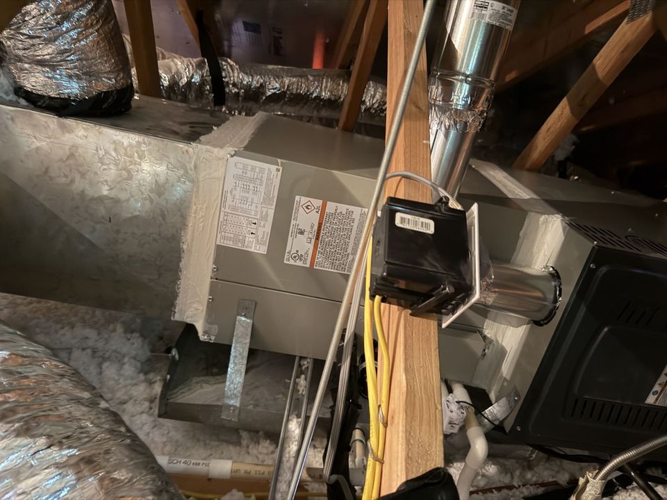Air handler with A2L refrigerant labeling installed in an attic by Air-Exx