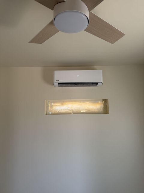Ductless mini-split indoor head mounted on a wall