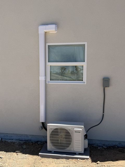 Ductless mini-split outdoor unit installed by Air-Exx