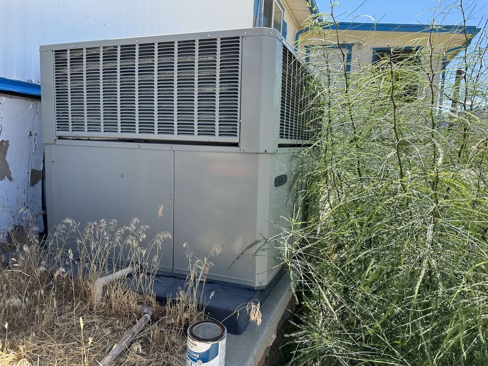 Evaporative cooler mounted at a manufactured home in the Mohave Valley