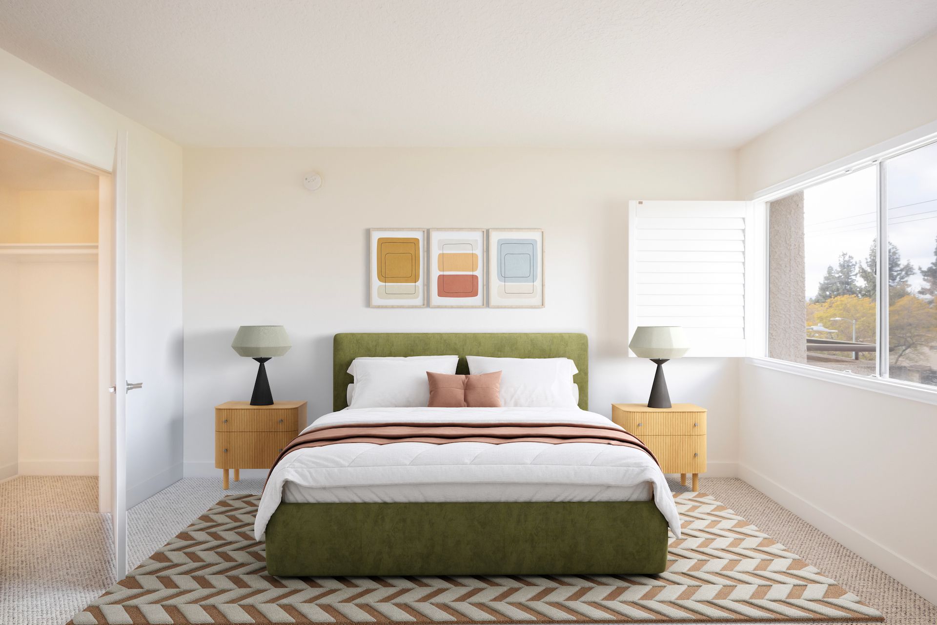 Bedroom with green bed, two nightstands, artwork, closet, and window.