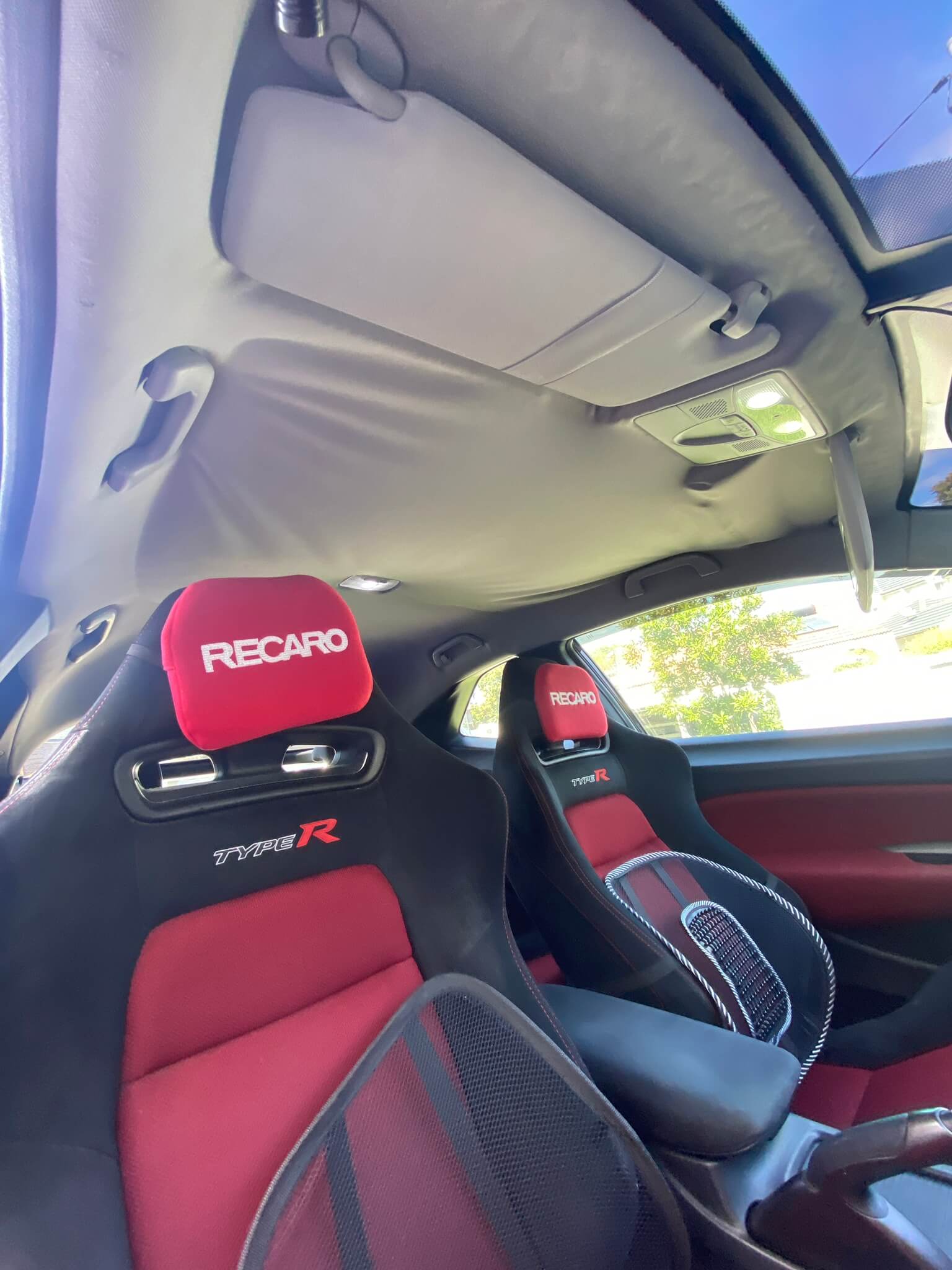 car interior with sagging roof liner