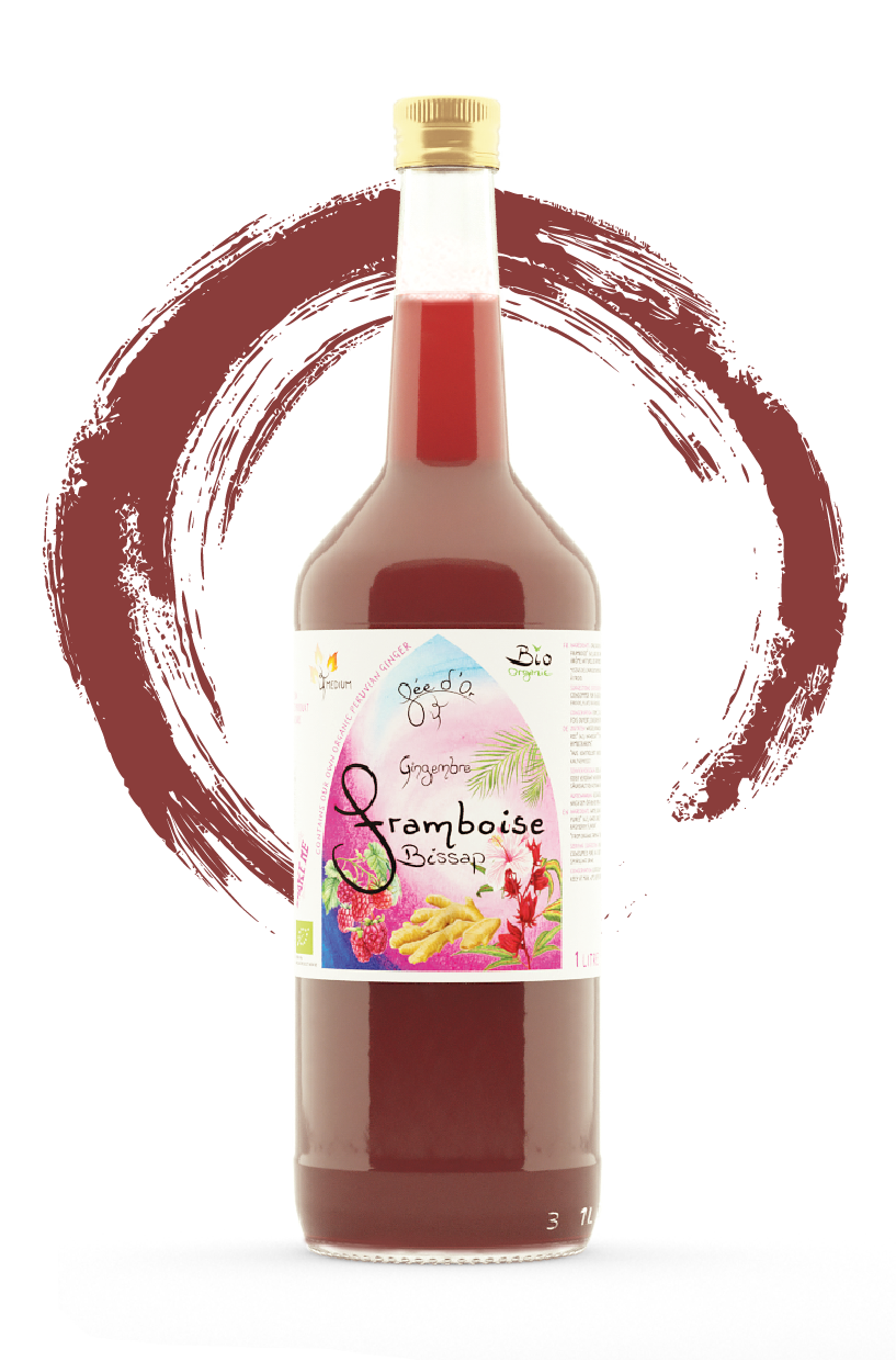 Bouteille de jus de canneberge avec une étiquette florale et un fond à motifs circulaires rouges.