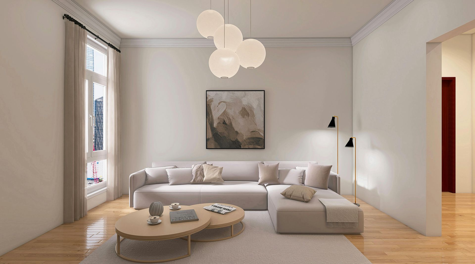 Modern living room with a beige sectional sofa, circular wooden coffee tables, a large abstract painting, and a chandelier.