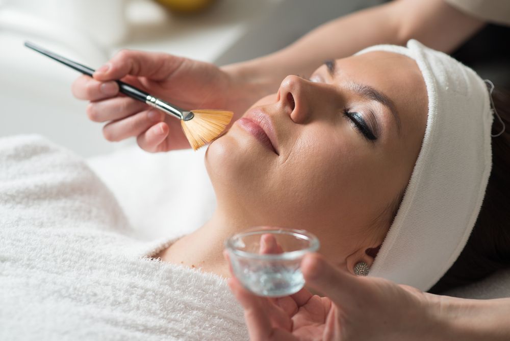 Woman Receiving Facial Treatment — Artisan Cosmetic Tattoo & Beauty in Worongary, QLD