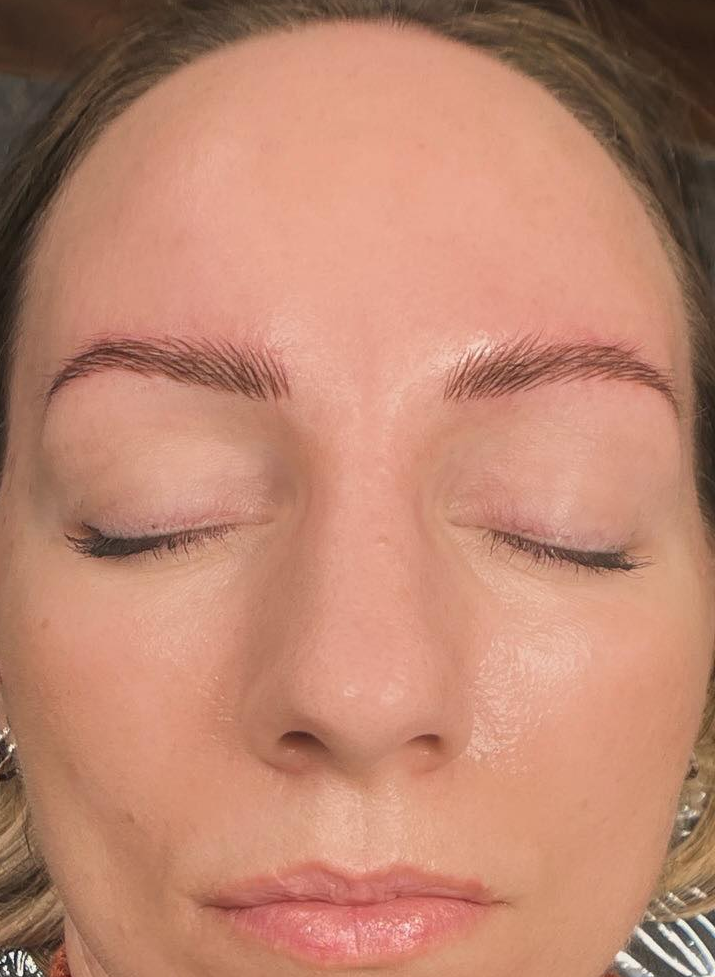 Woman With Closed Eyes, Fresh Eyebrow Tattoo. Brown Sweater — Artisan Cosmetic Tattoo & Beauty in Worongary, QLD