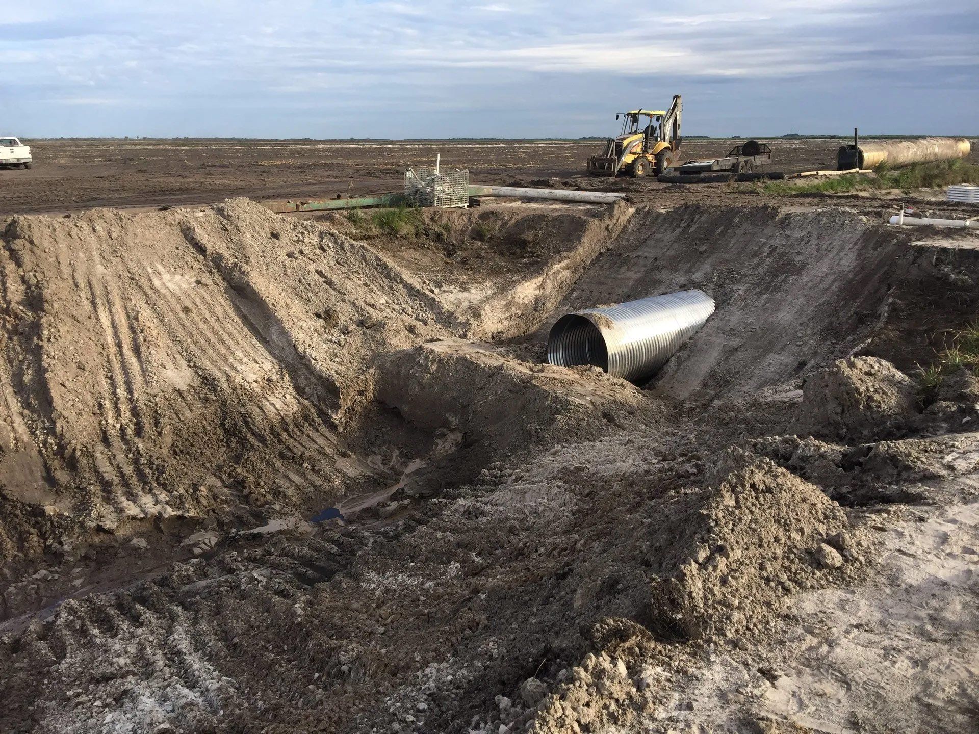 Excavation For Installing Underground Pipes — Clewiston, FL — Ridgdill & Son Excavation For Installing Underground Pipes — Clewiston, FL — Ridgdill & Son