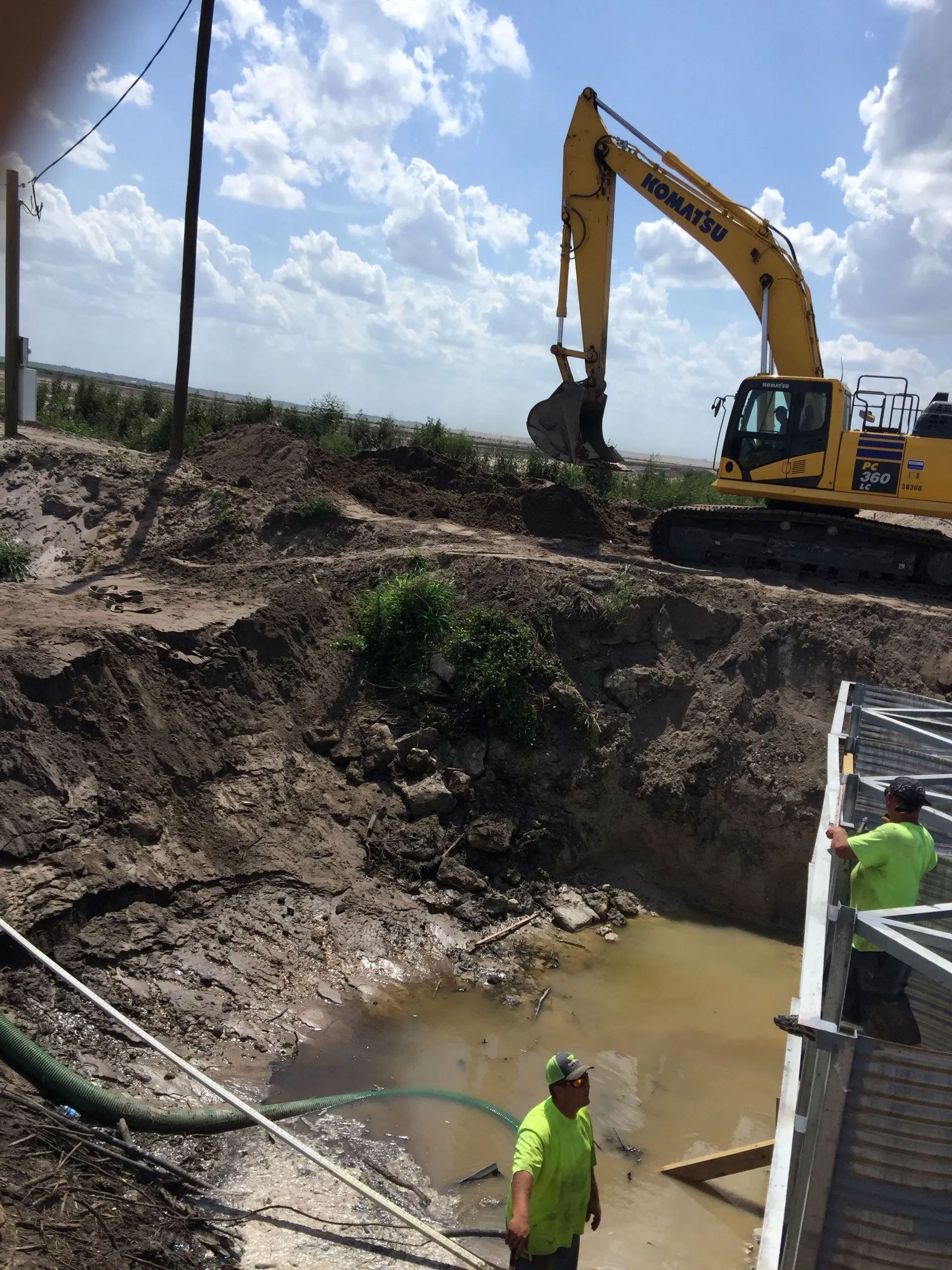 Workers And Excavation Vehicle — Clewiston, FL — Ridgdill & Son Workers And Excavation Vehicle — Clewiston, FL — Ridgdill & Son