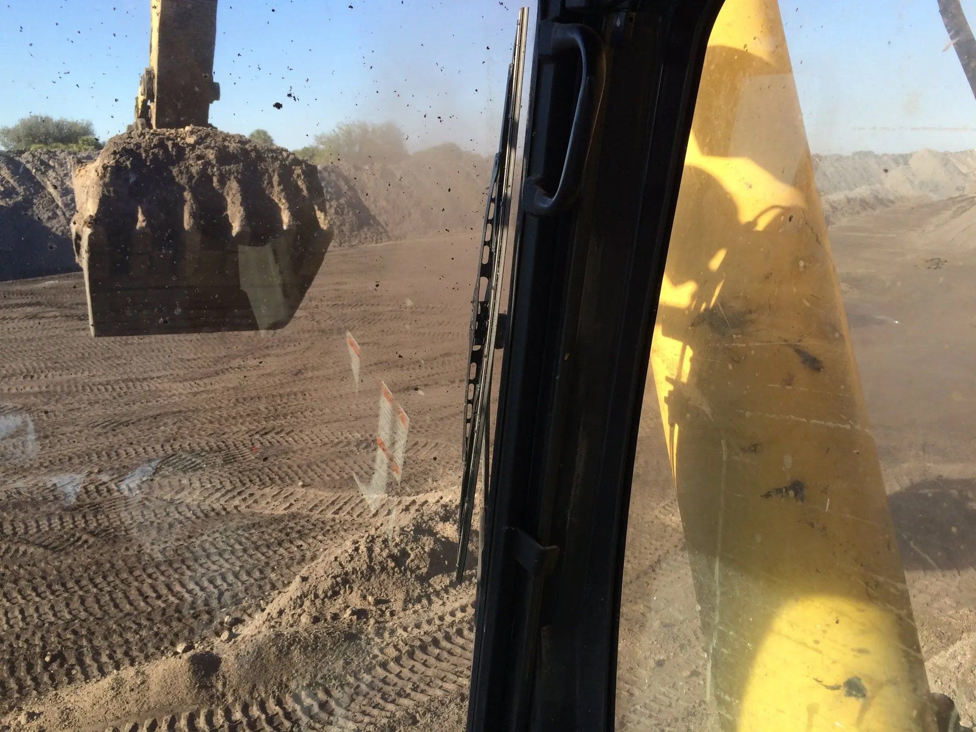 Excavator At Work — Clewiston, FL — Ridgdill & Son Excavator At Work — Clewiston, FL — Ridgdill & Son