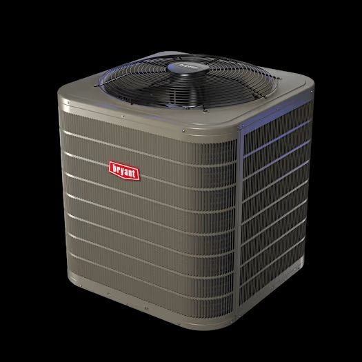 A gray air conditioner is sitting on a white surface.