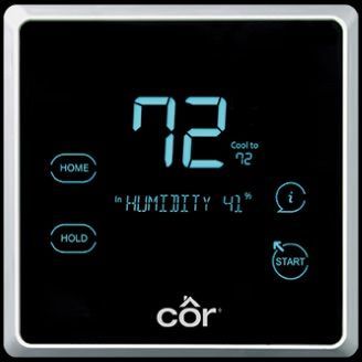 A thermostat with a screen that says 72 degrees on it.