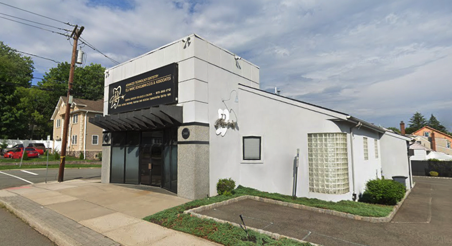Exterior view of Club 32 Dentistry located in Clifton, NJ, showcasing the modern facility.