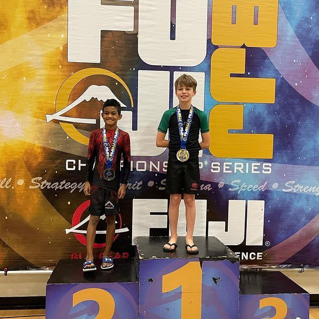 Two children on a podium.