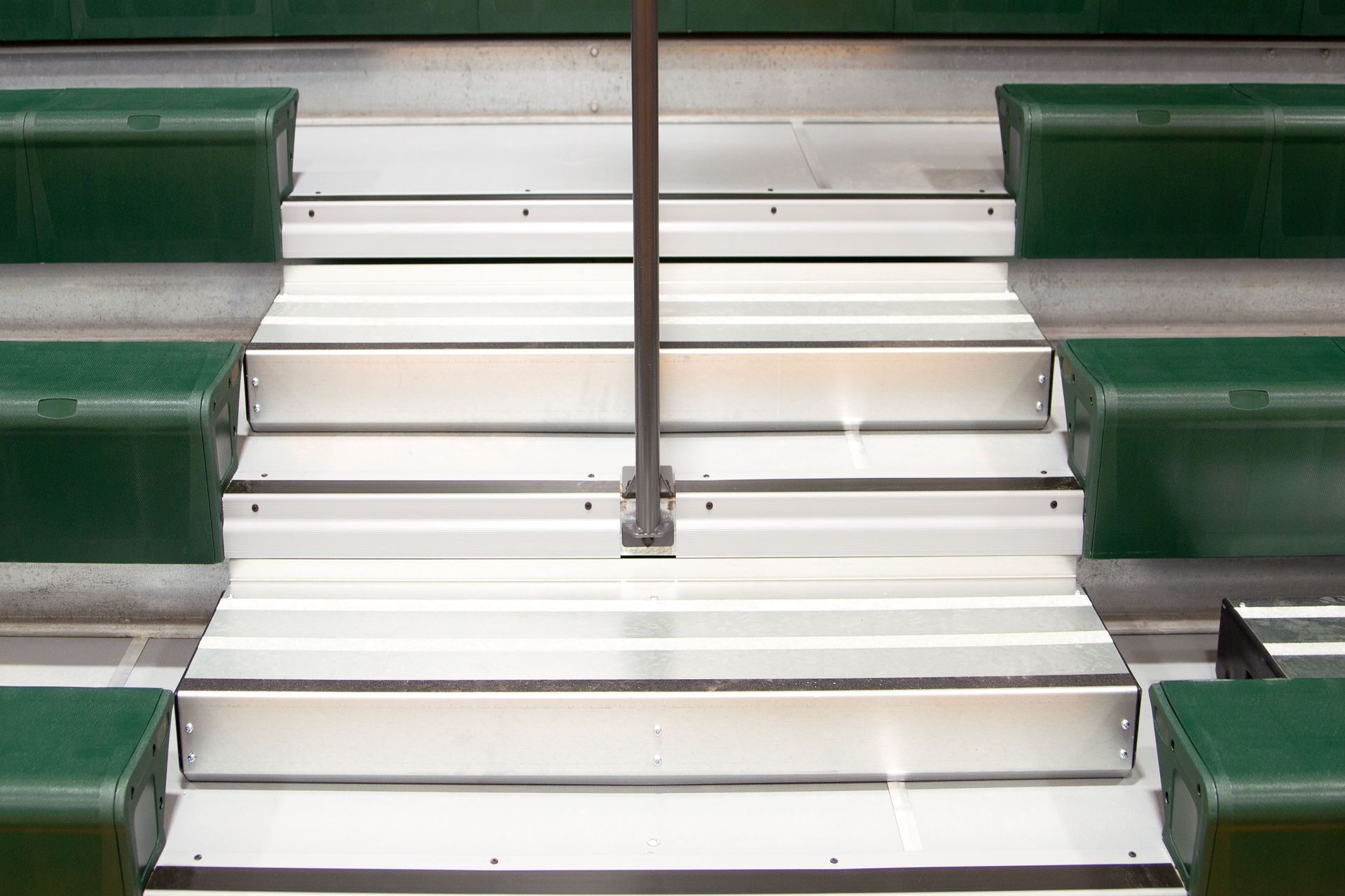 The steps on the Interkal telescopic bleachers at Holy Name Catholic School after renovation