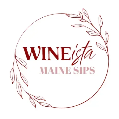 The logo for wineista maine sips is a circle with leaves in it.