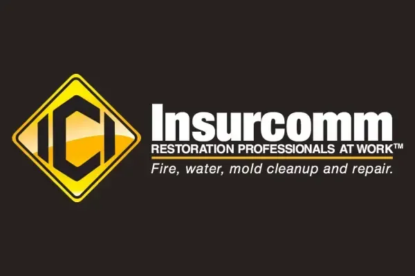 A logo for insurcomm restoration professionals at work