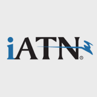 A logo for iatn with a bird on it