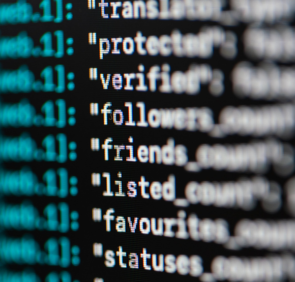 A computer screen displays code