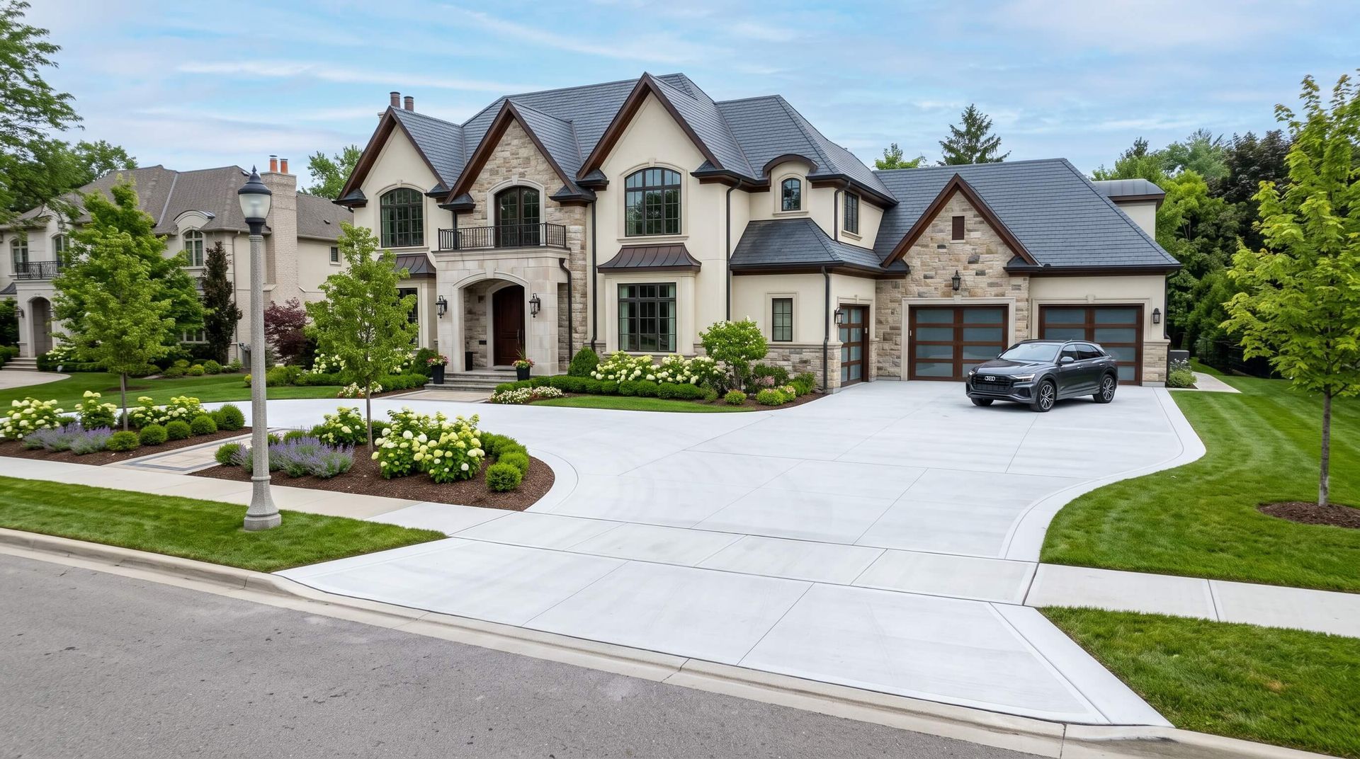 Luxury home with a new concrete driveway