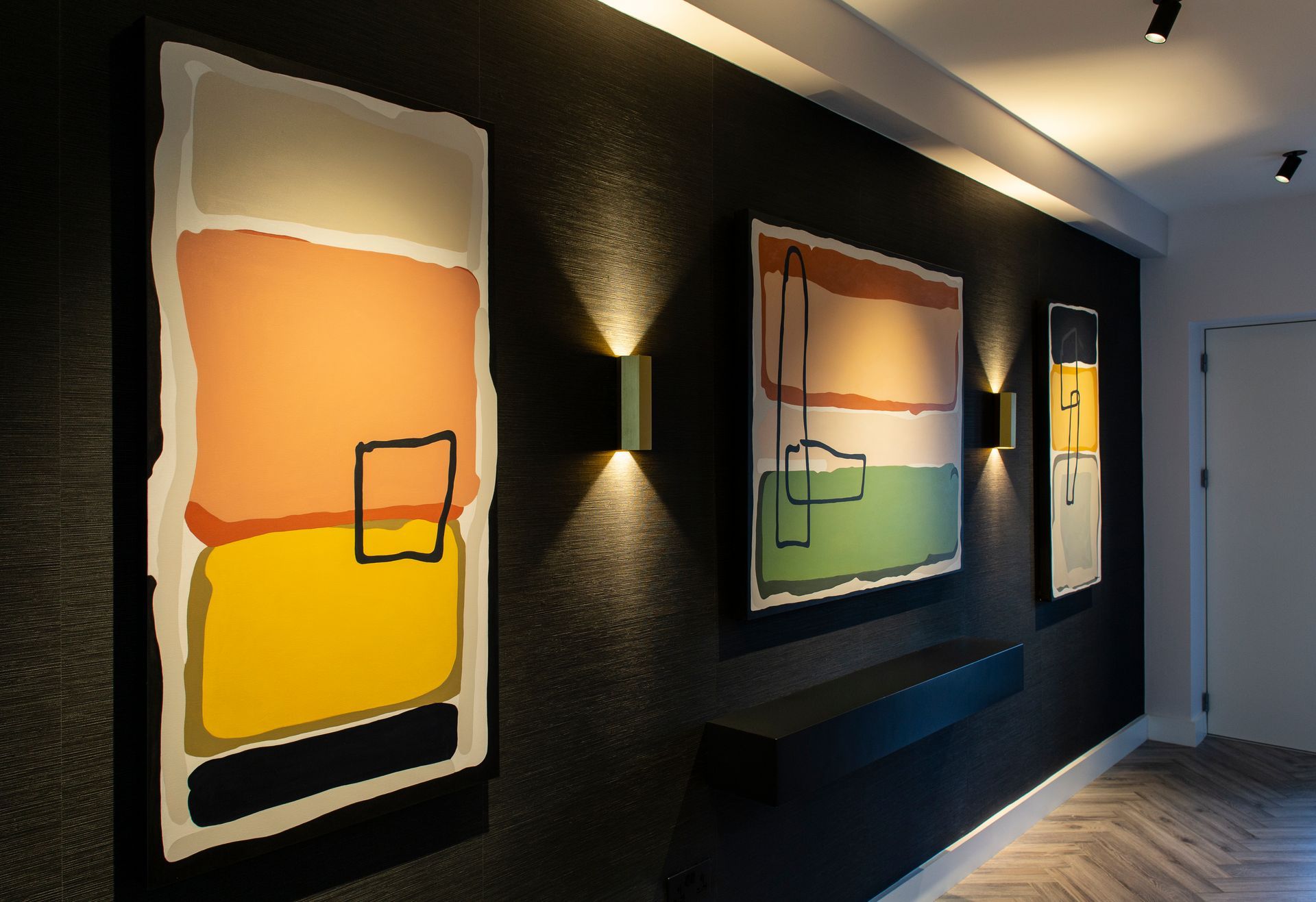 Custom art commissioned for a gallery hallway by Cush Interiors