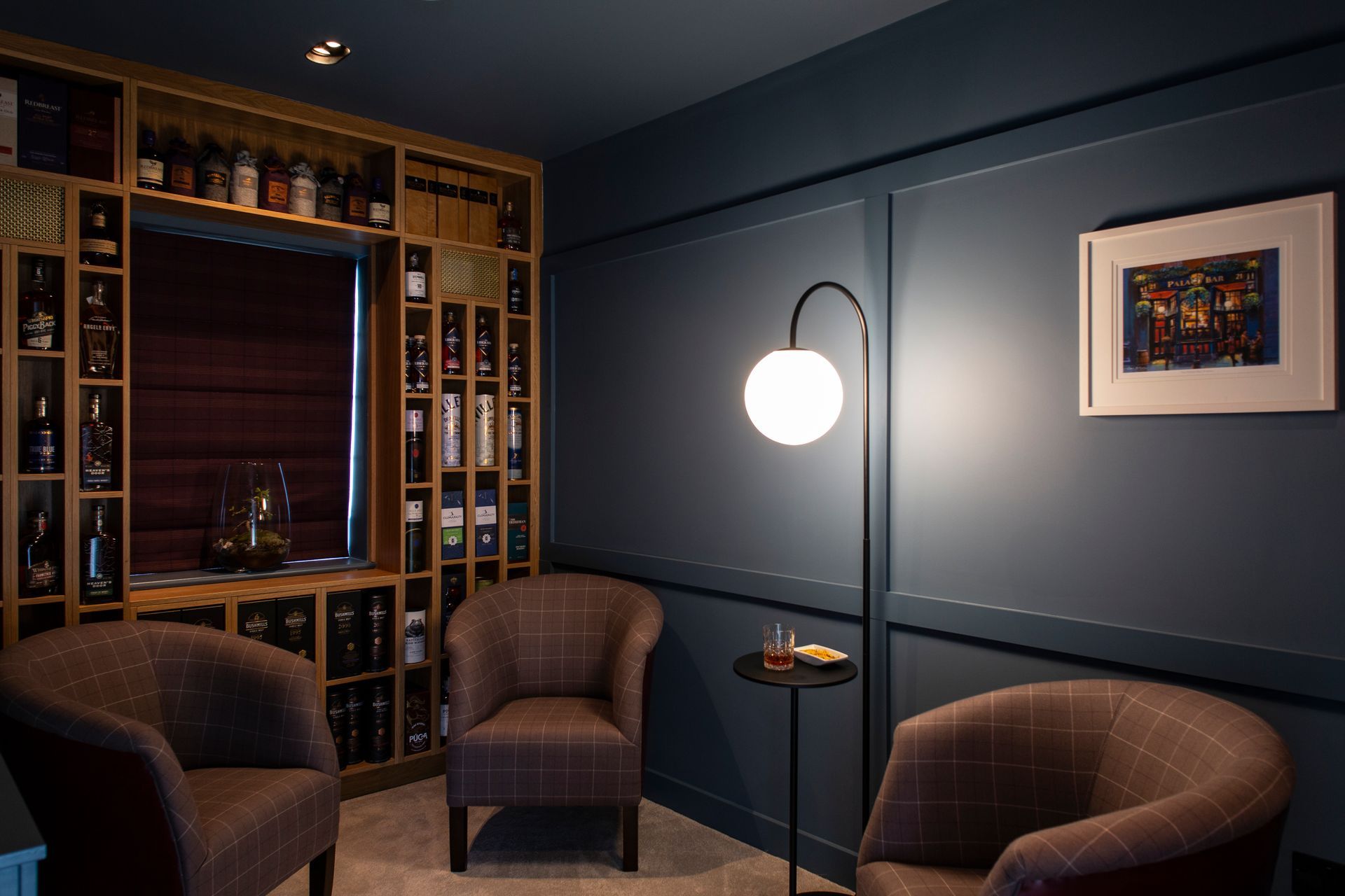 Whiskey den by Cush Interiors