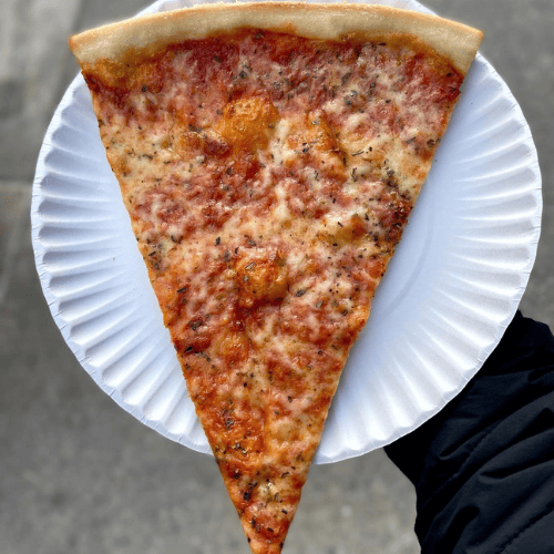 Cheese pizza slice from Mimi’s Pizza in New York City
