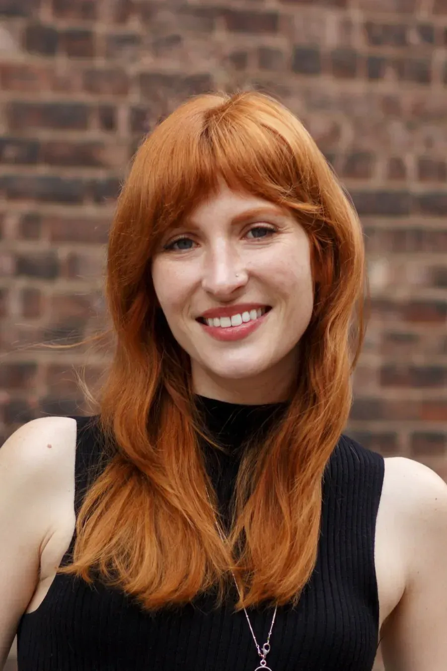 Emily Pearse headshot, tour guide at Tasty Tours NYC