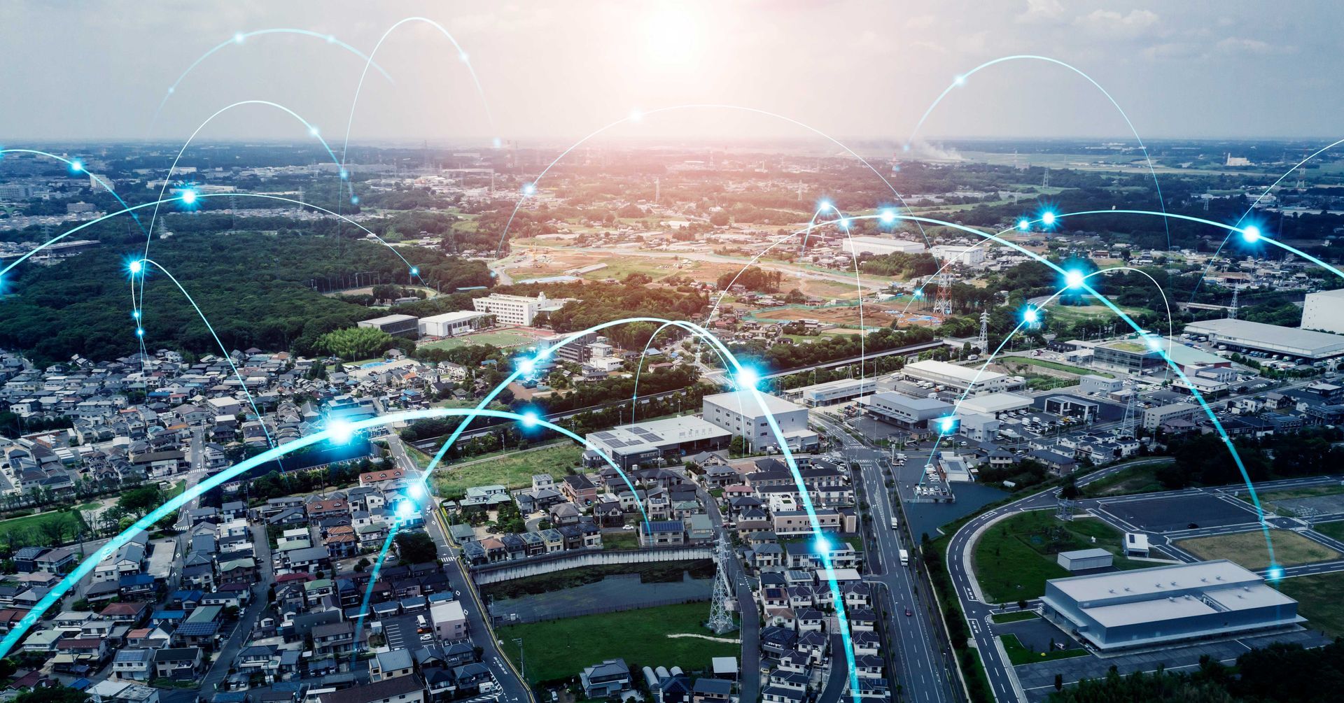 An aerial view of a city with a lot of lines connected to each other.