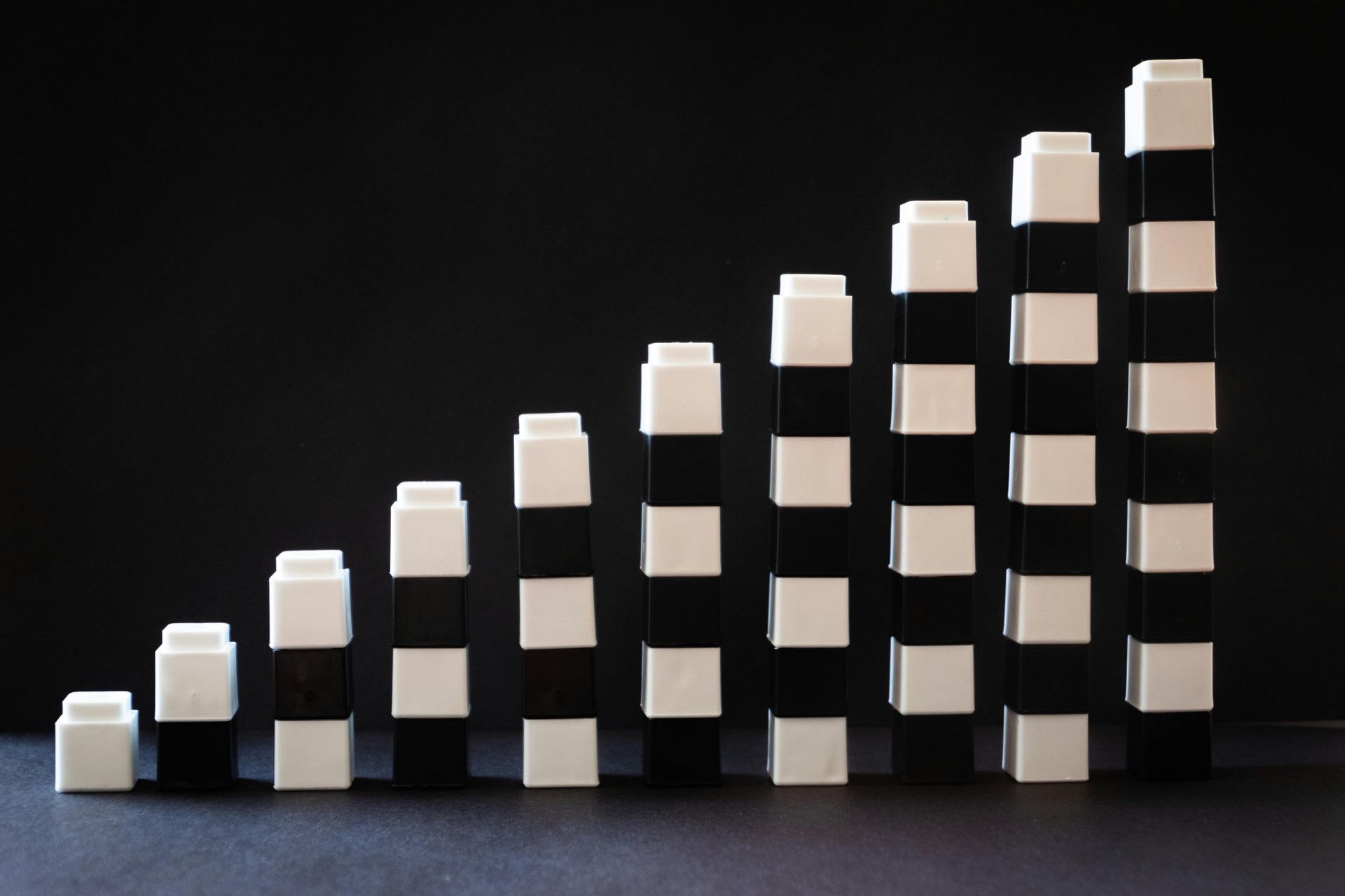 Black and white checkered blocks stacked on top of each other.