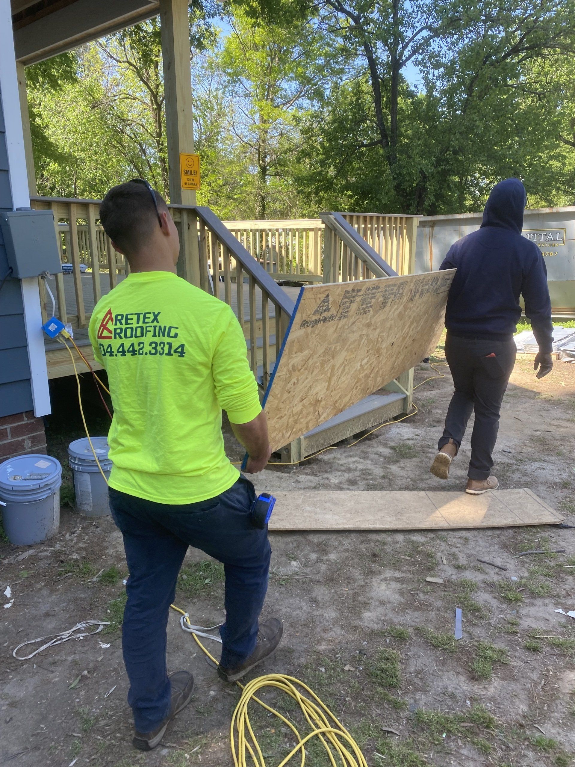 Image of RETEX’s Cale Kammerling and Mark Erickson volunteering with Richmond Habitat for Humanity in April 2022.