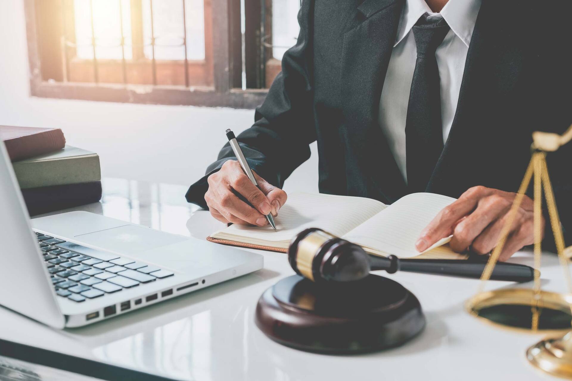 Lawyer Taking Down Notes — Graham, NC — Brad Buchanan Attorney At Law PLLC