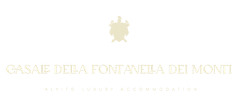 Logo for Casale Della Fontanella Dei Monti with a small crest icon above the text in light gold on a white background.
