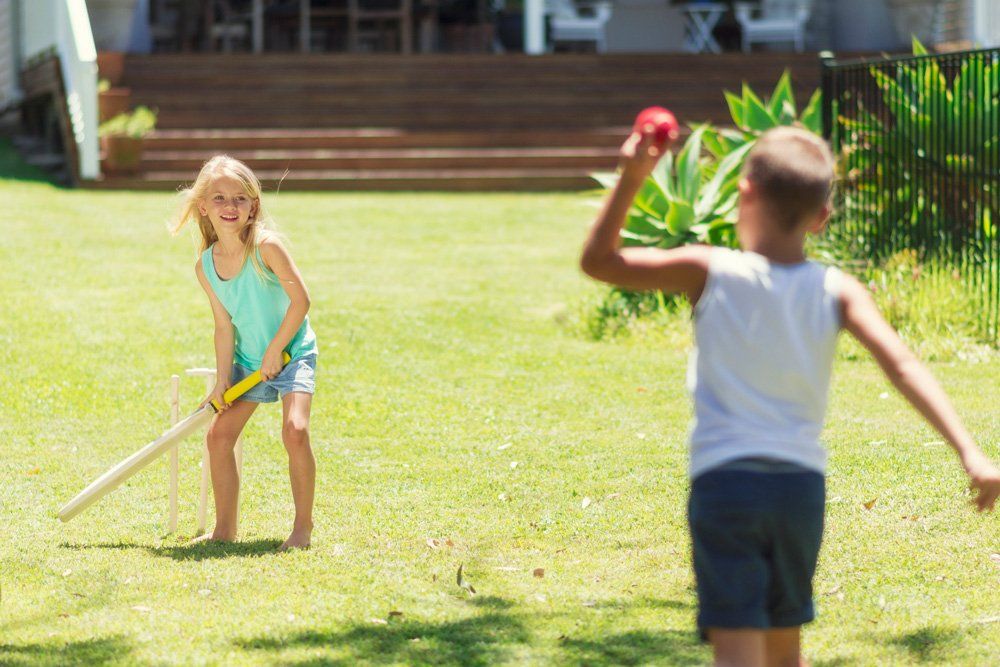 Kids Playing Cricket — Sydney, NSW — Emerald Lawn Landscape