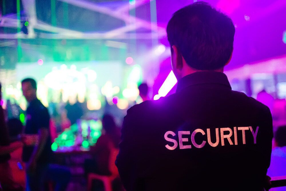 Security Guard Watching the Crowd — Clinton Security Services In Armidale, NSW