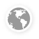 A gray, circular icon featuring a stylized white map of North and South America centered on a white background.