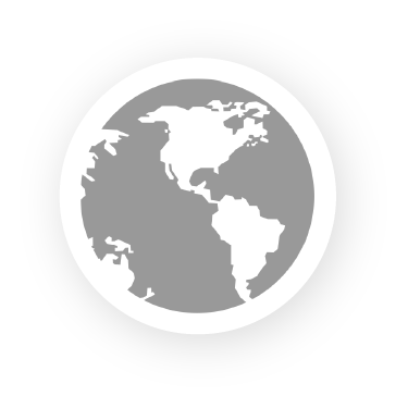 A gray, circular icon featuring a stylized white map of North and South America centered on a white background.
