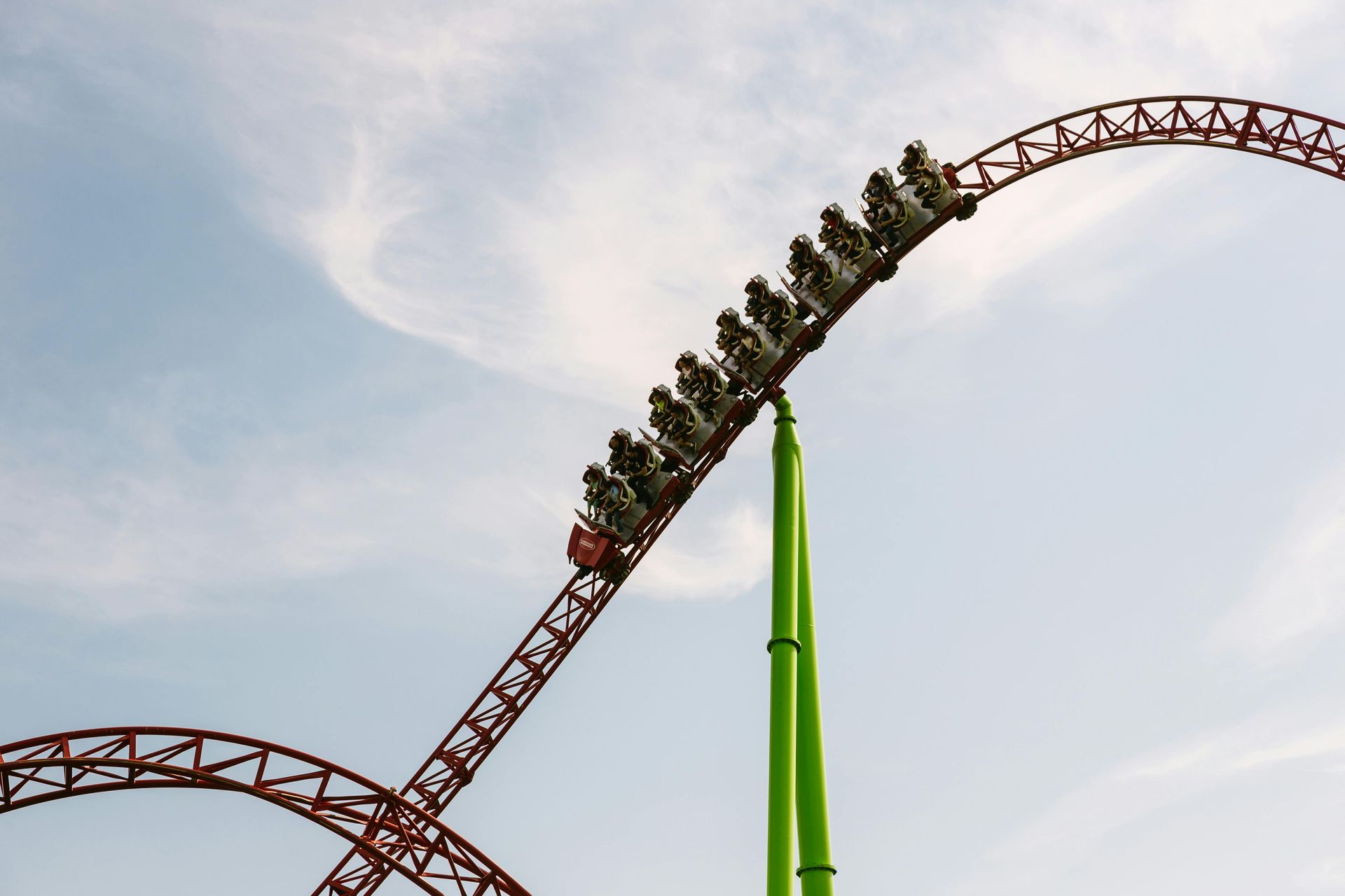 A roller coaster with a lot of people on it