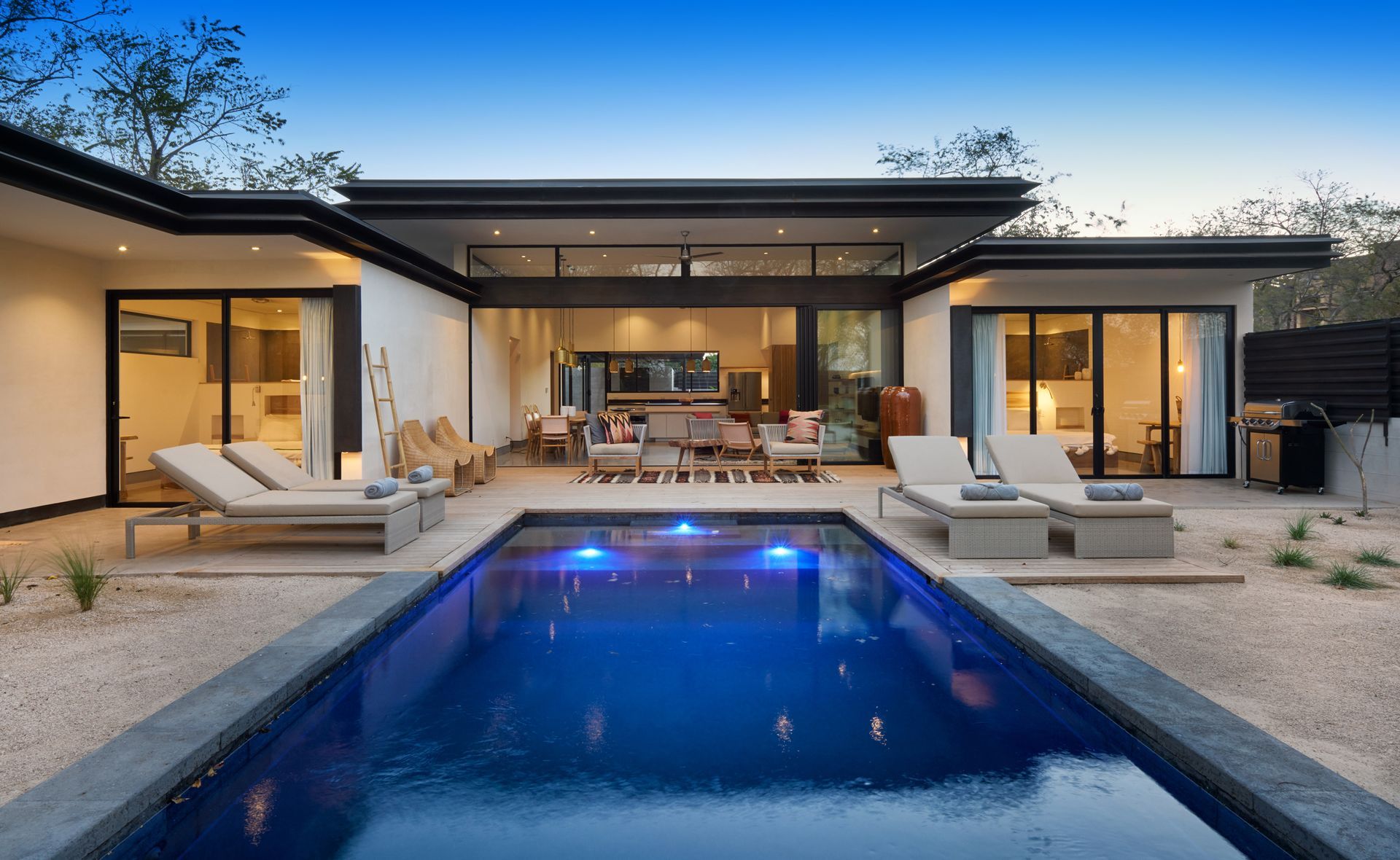 A large house with a swimming pool in the backyard