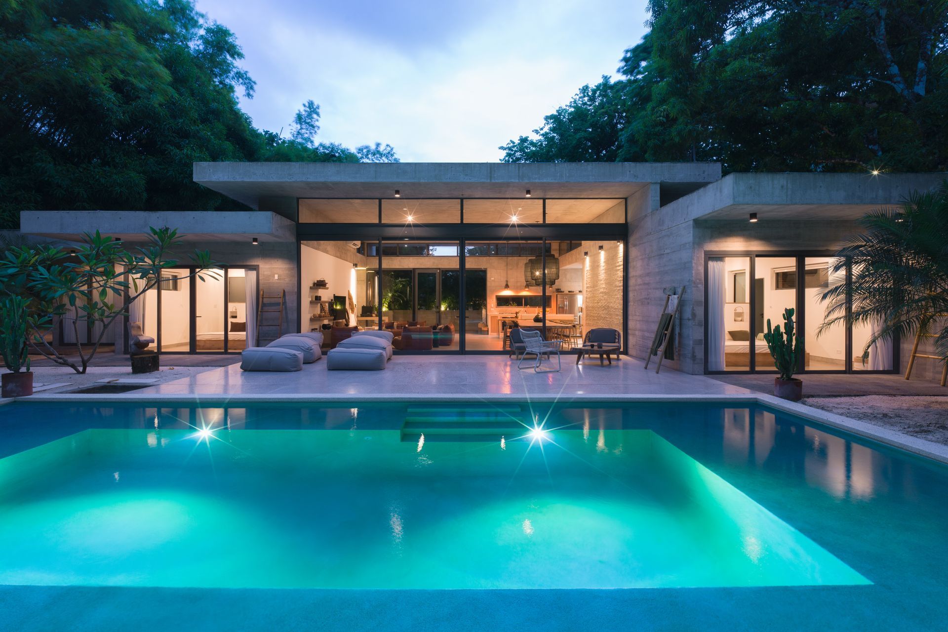 A large house with a swimming pool in the backyard