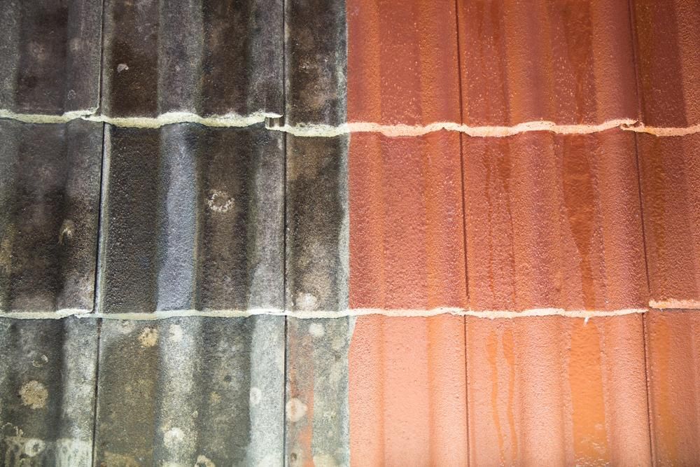 A Close Up Of A Black And Red Roof — Glenroofing Pty Ltd In Kempsey, NSW