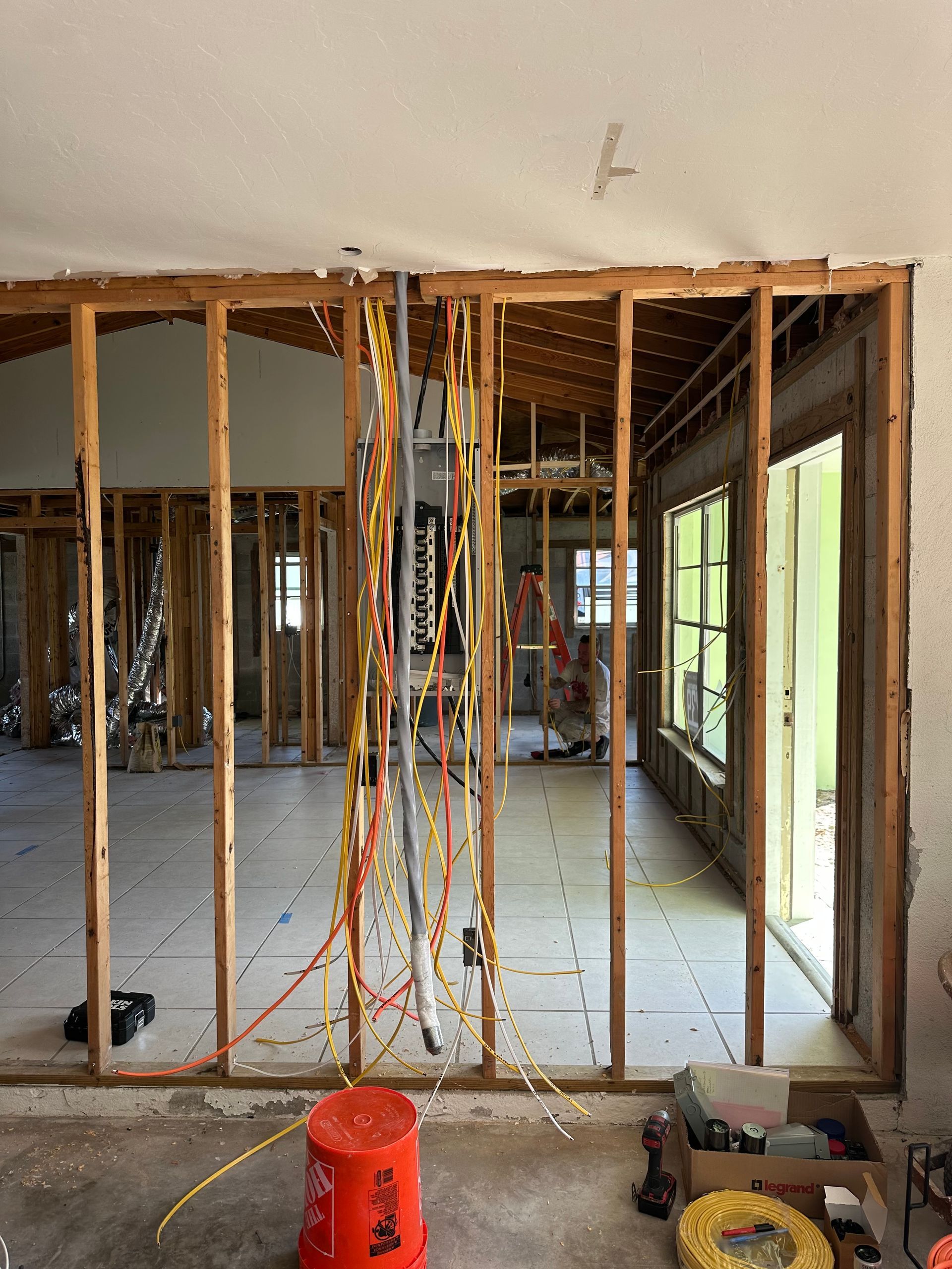 A large room with a lot of wires hanging from the ceiling.