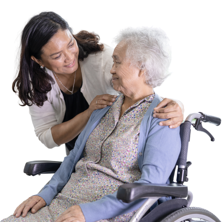 A woman is putting her arm around an older woman in a wheelchair