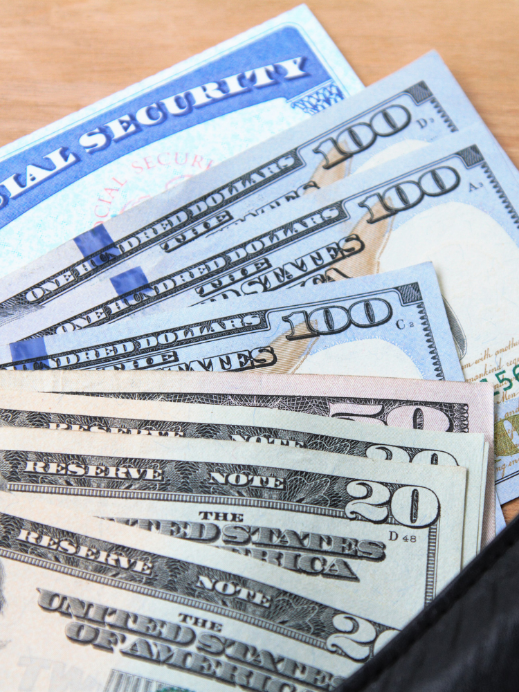 A wallet filled with us dollars and a certificate of national security