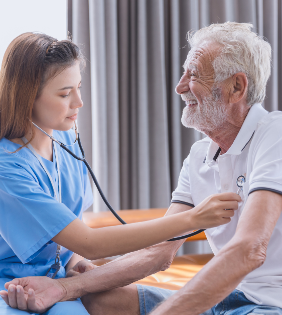 A nurse is listening to an older man 's heartbeat with a stethoscope.